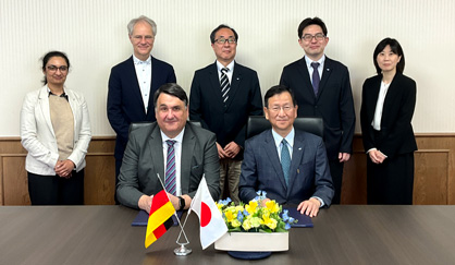 Commemorative group photo at the signing ceremony